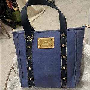 Louis Vuitton Antigua cabas. Elegant Navy Tote with Gold Details